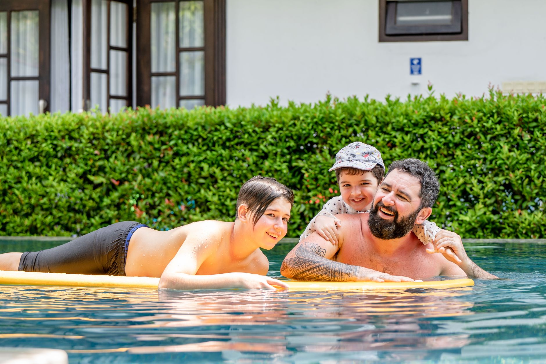 Family enjoying their inground pool